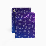 The case features a built-in stand for hands-free viewing and is displayed on a modern desk with the iPad in landscape mode