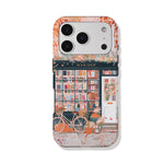 Phone case with a bookshop design featuring a bicycle and books.