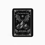Black and white tarot card with mountain and bat design on a white background