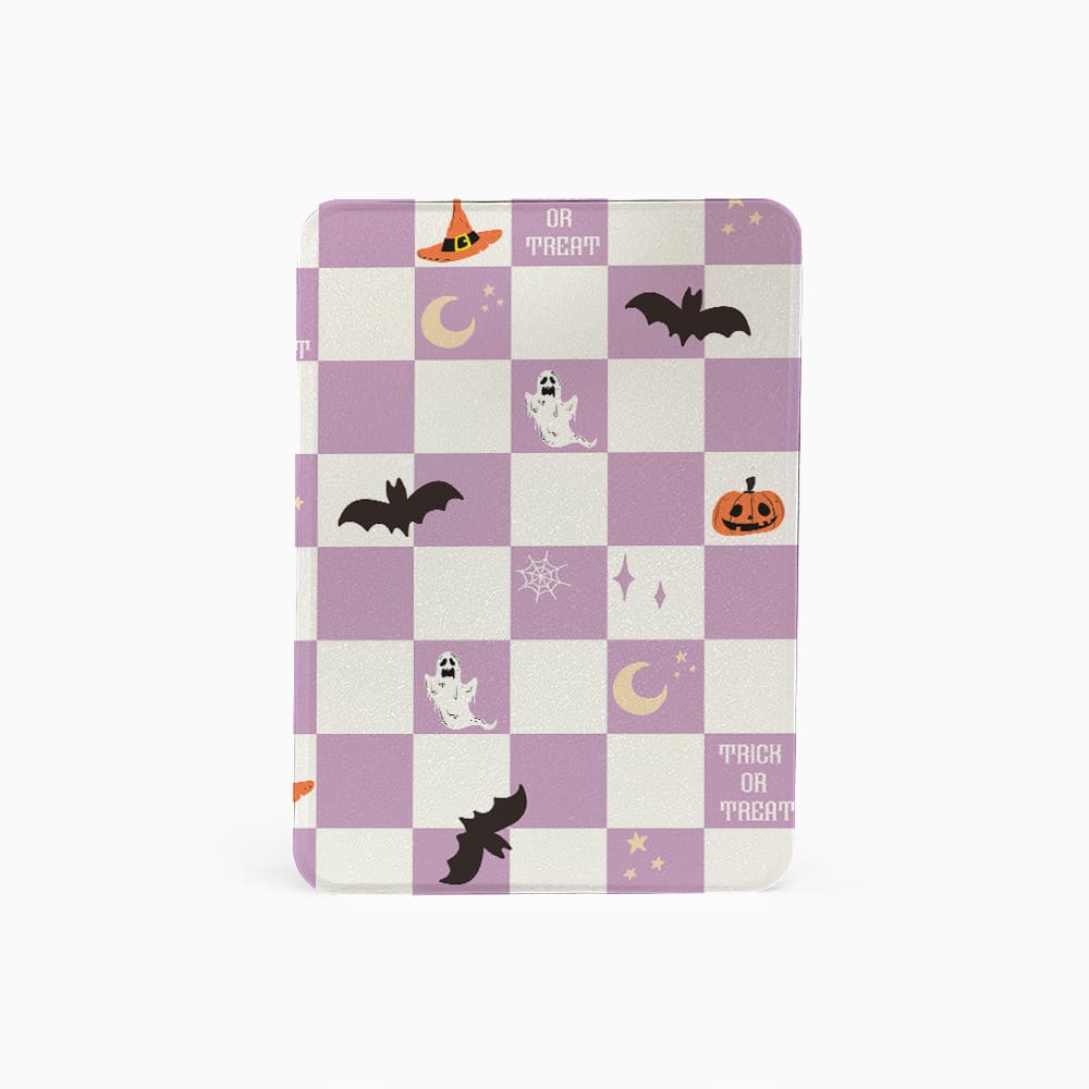 Checkered notebook with Halloween-themed design on a white background