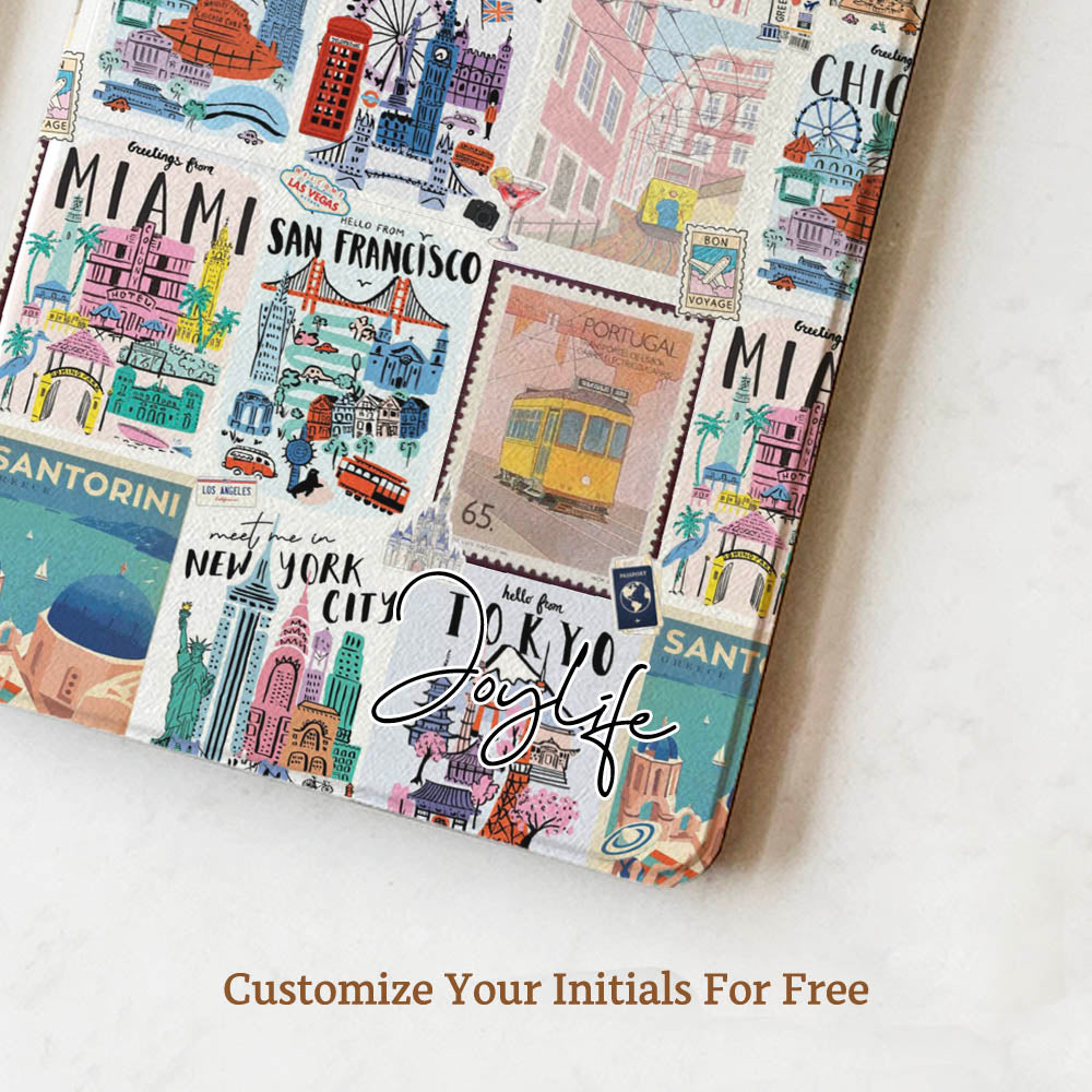 Decorative wall art with city-themed illustrations and 'Joy Life' text on a white surface.