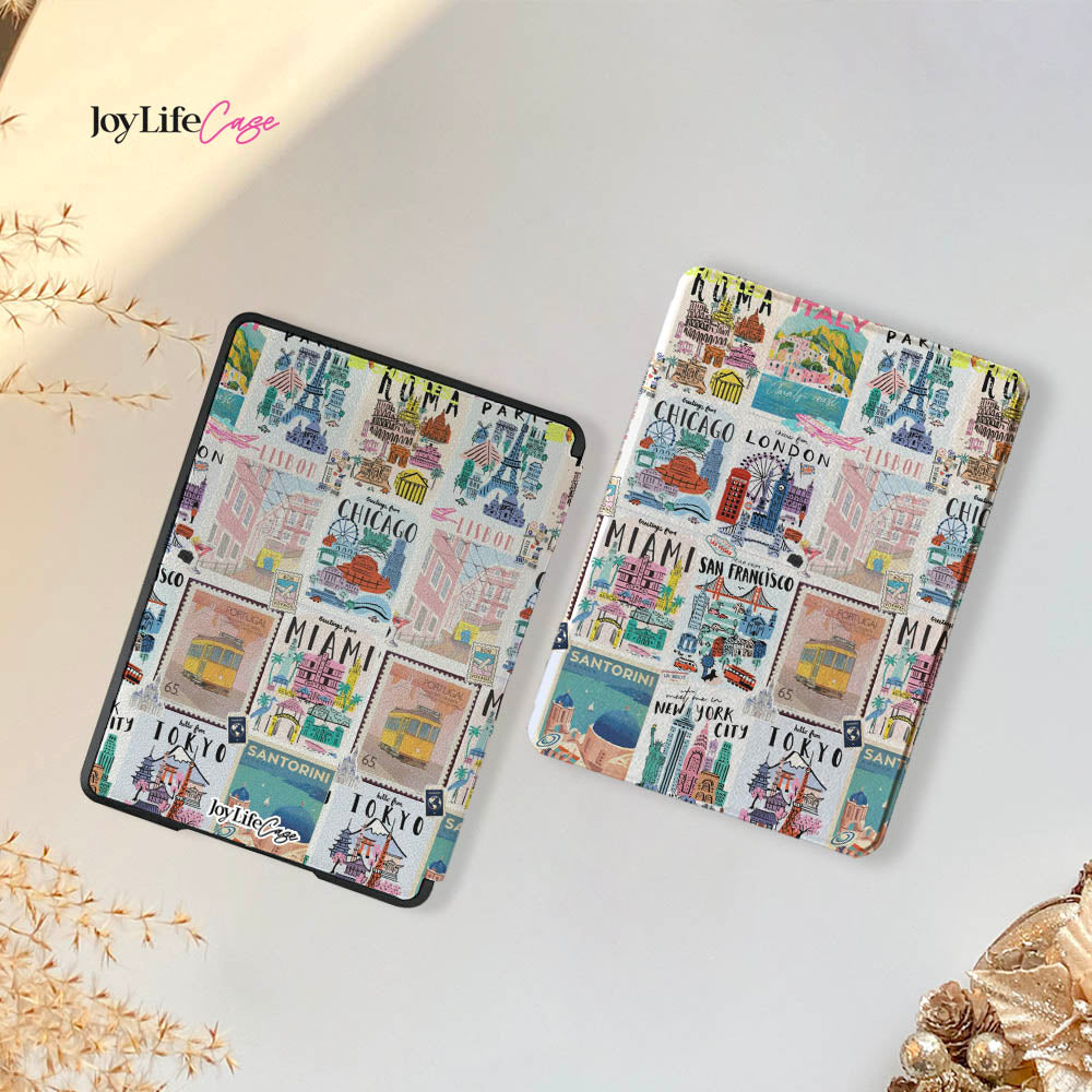 Two colorful travel-themed phone cases on a light surface with 'joyLife Creations' branding.