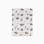 The case is displayed on a table with a Kindle Paperwhite device inside, showcasing the sleek design and perfect fit.