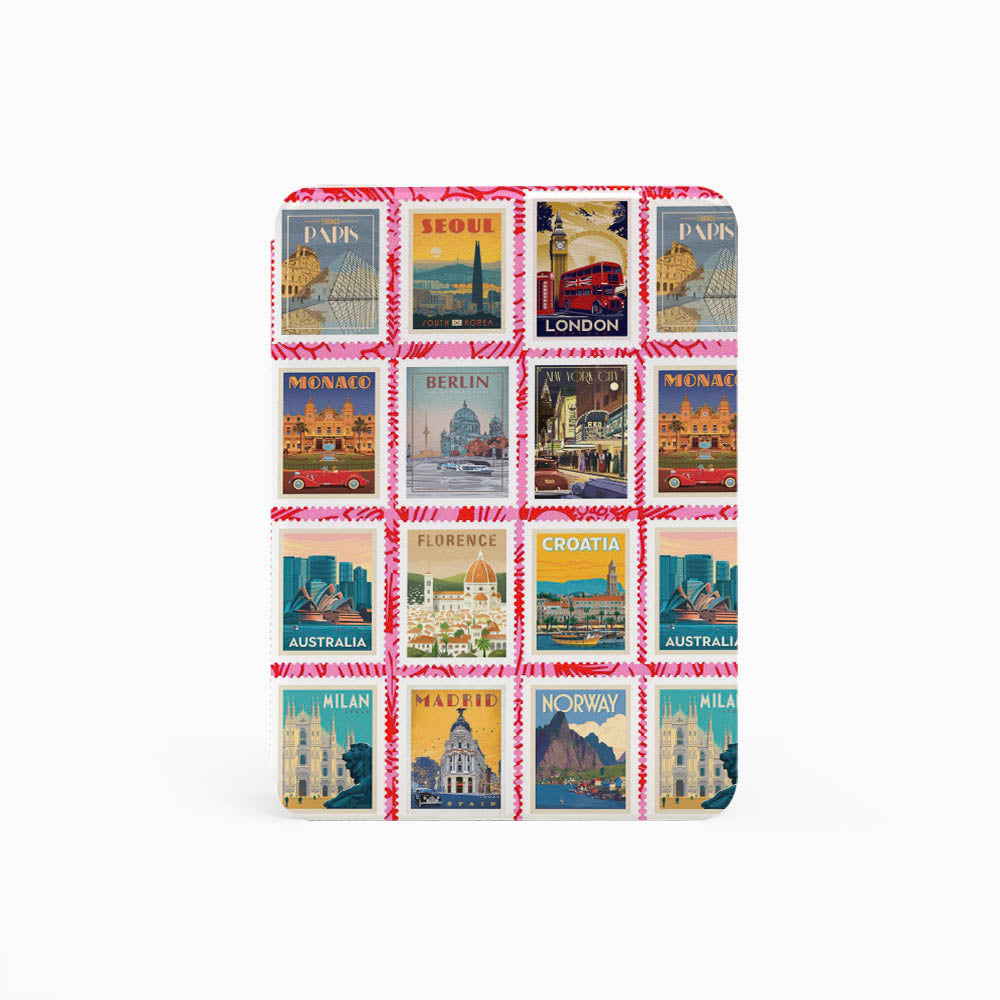 Small notebook with travel-themed cover featuring various cities
