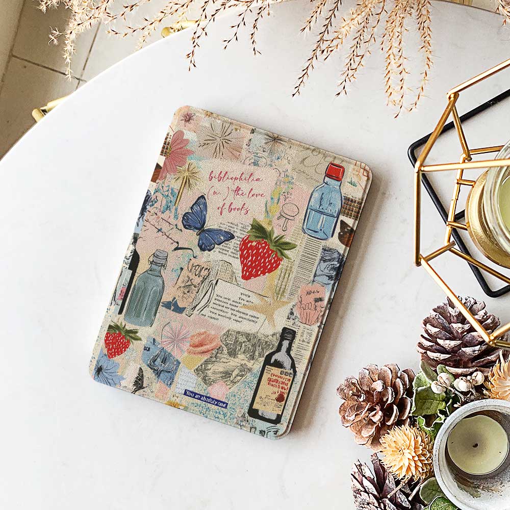 Travel-inspired protective case for Kindle Fire featuring a vibrant collage of maps, landmarks, and adventure motifs, offering durable protection and a stylish design.