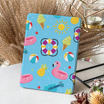 Tablet case with summer-themed design on a surface