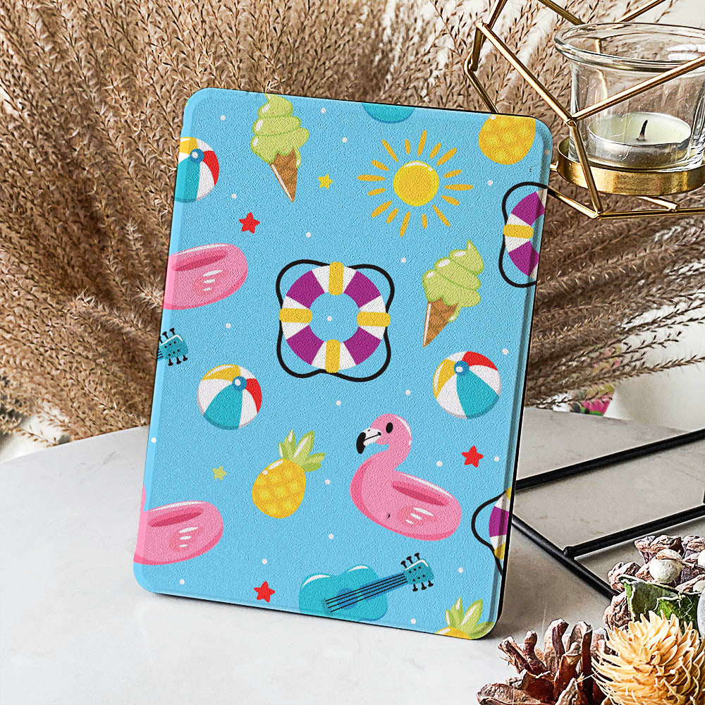 Tablet case with summer-themed design on a surface