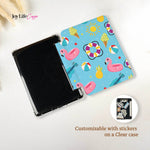 Tablet case with customizable stickers on a clear case, featuring beach-themed designs.