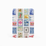 Small notebook with a design of colorful postage stamps on a white background